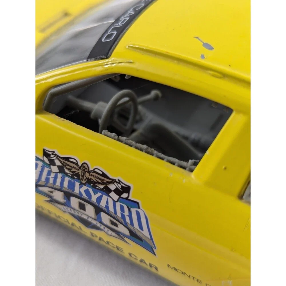 1996 Racing Champions Chevrolet BriCkyard 400 1:64 Monte Carlo Car Yellow
